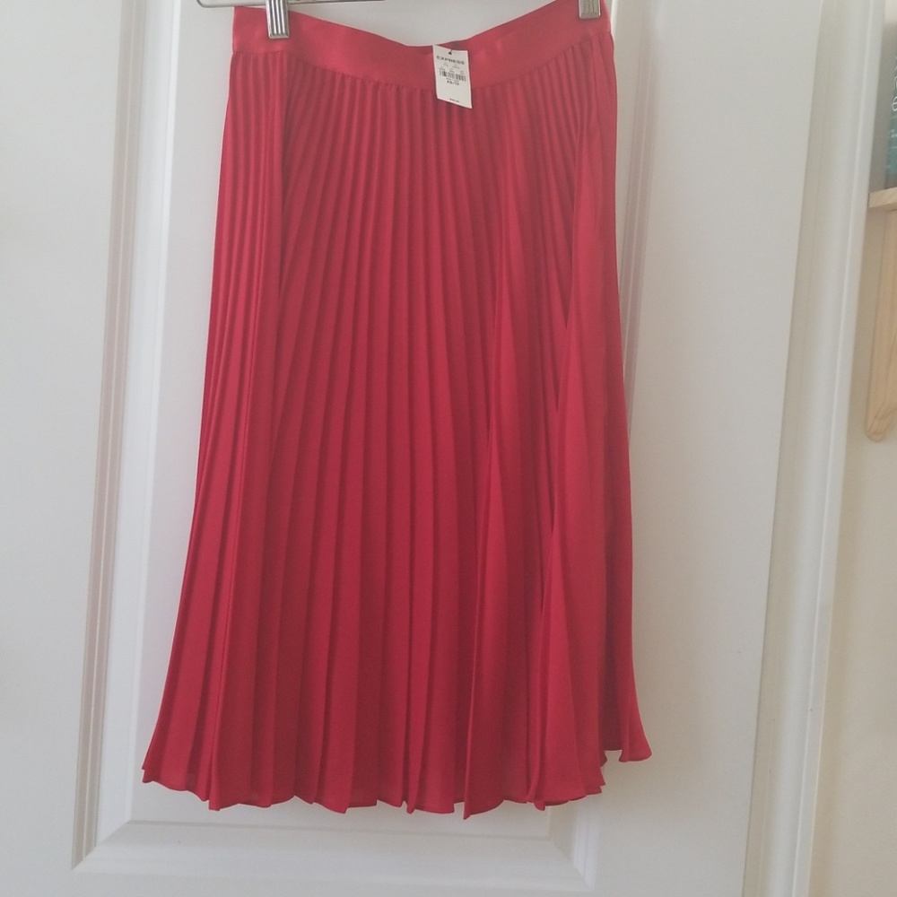 Red pleated skirt